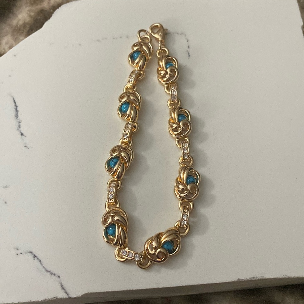 Blue and gold bracelet with rhinestone details